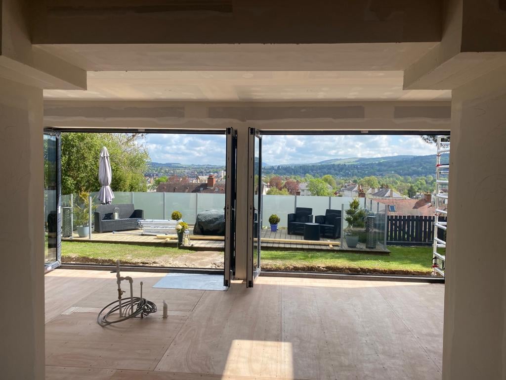 How much does it cost to knock down a load bearing wall? John ster