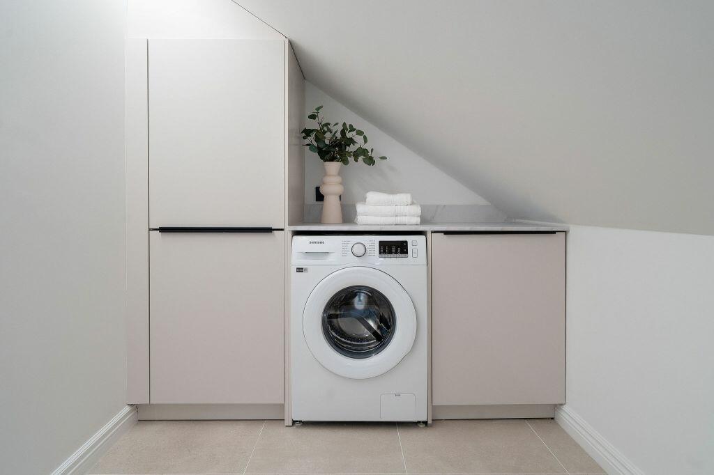 UTILITY SPACE IN AN EDINBURGH TENEMENT LOFT CONVERSION